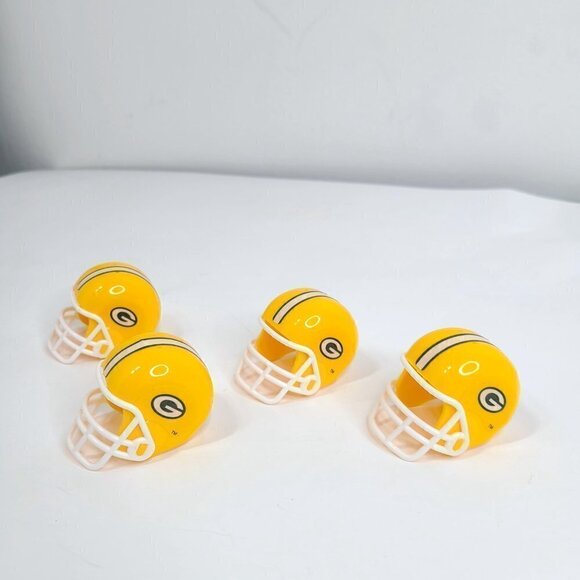 Vintage 80s Green Bay Packers Yellow Gumball Mini Helmet  Set of 4 - Picture 1 of 8